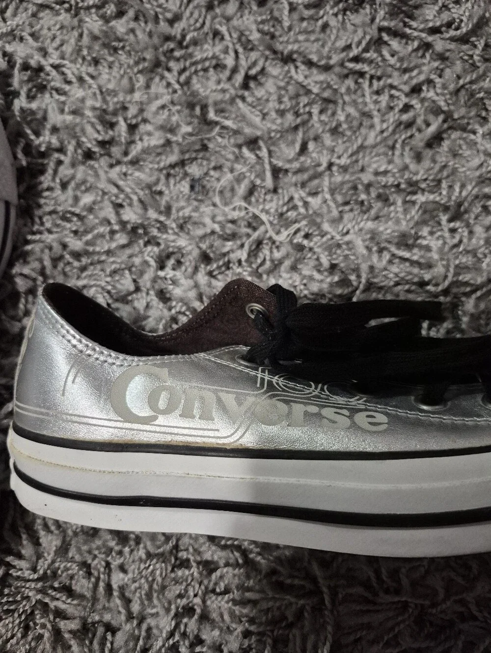 Silver Converse Sneakers (never worn but some flaws)